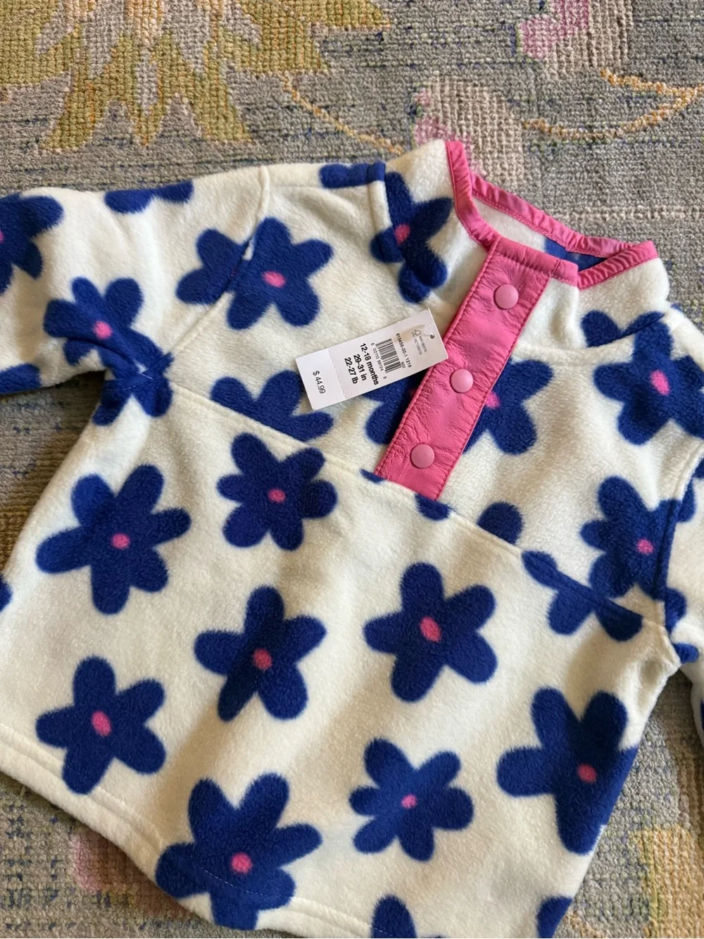 Girls White Fleece Pullover Jacket with Blue Flower Print and Pink Trim